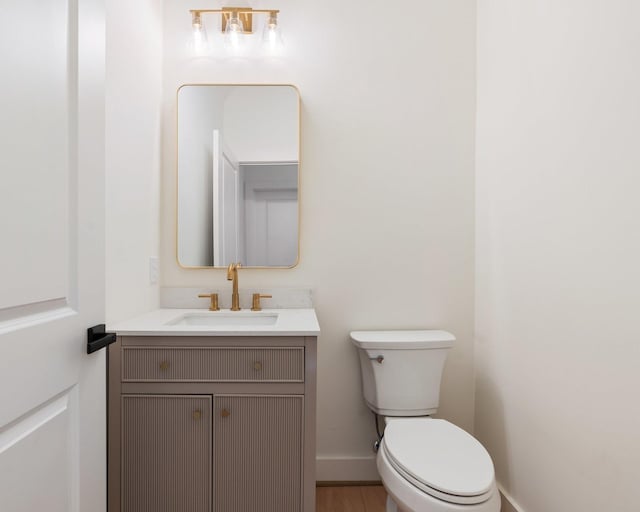 1420 Flamingo St, Conroe, TX 77385 - bathroom with vanity, toilet, and baseboards