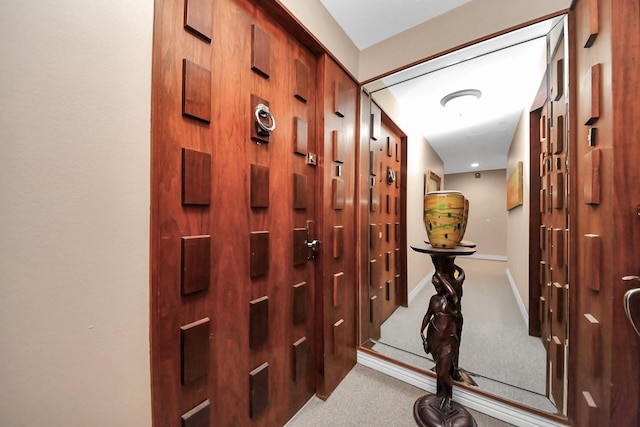 5050 Woodway Dr Unit 7L, Houston, TX 77056 - corridor featuring carpet and baseboards