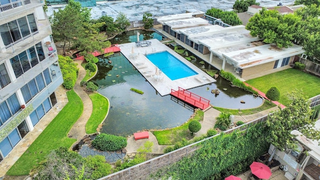 5050 Woodway Dr Unit 7L, Houston, TX 77056 - drone / aerial view of a pool area