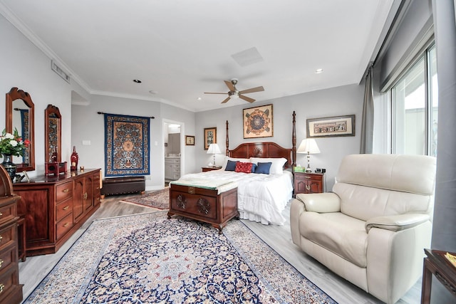 5050 Woodway Dr Unit 7L, Houston, TX 77056 - bedroom with light wood-style flooring, ornamental molding, recessed lighting, ceiling fan, and connected bathroom