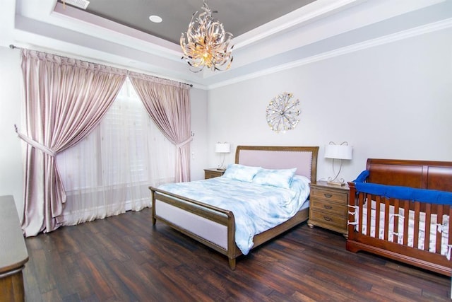 14115 Woodthorpe Ln, Houston, TX 77079 - bedroom featuring a raised ceiling, a chandelier, wood finished floors, and ornamental molding