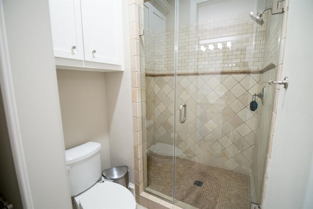 14115 Woodthorpe Ln, Houston, TX 77079 - bathroom with toilet and a stall shower