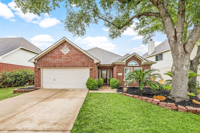 view of front of property featuring brick siding, a garage, driveway, a front lawn, and roof with shingles