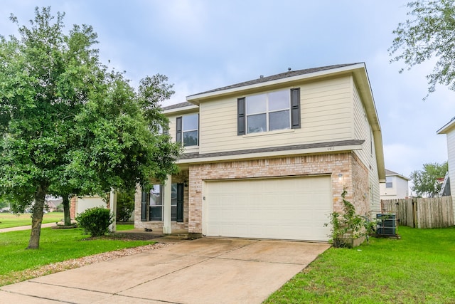 view of front of house featuring brick siding, an attached garage, and driveway