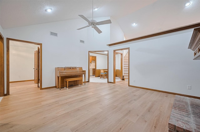 16218 Capri Dr, Jersey Village, TX 77040 - living room featuring a ceiling fan, light wood finished floors, baseboards, recessed lighting, and high vaulted ceiling