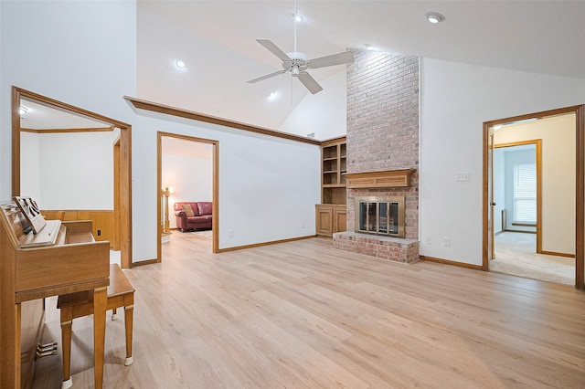 16218 Capri Dr, Jersey Village, TX 77040 - living area featuring high vaulted ceiling, a ceiling fan, light wood-style floors, baseboards, and a brick fireplace