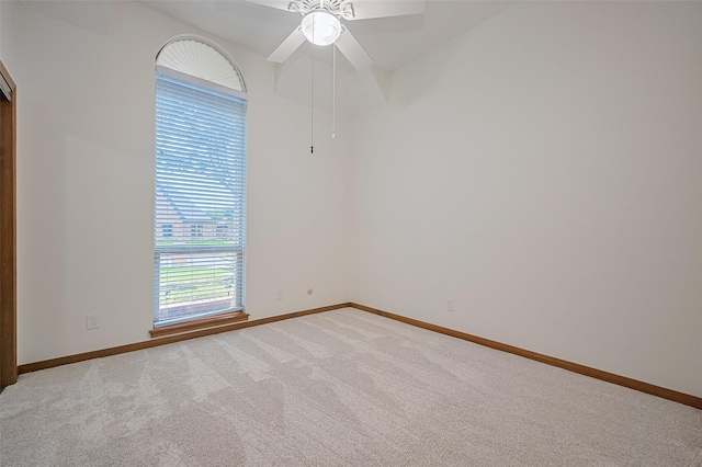 16218 Capri Dr, Jersey Village, TX 77040 - carpeted spare room featuring baseboards and ceiling fan