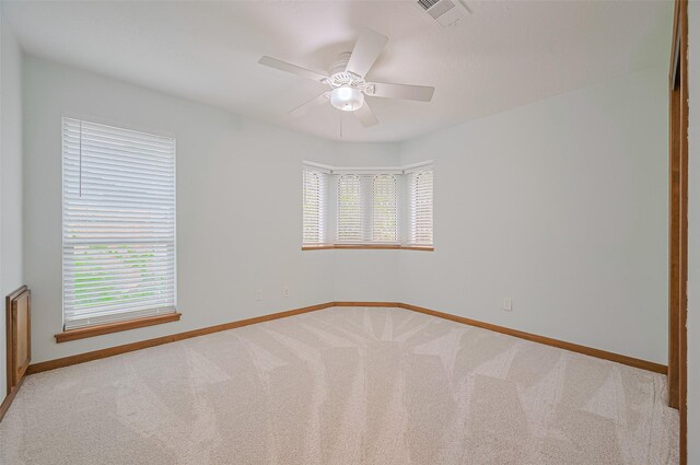 16218 Capri Dr, Jersey Village, TX 77040 - spare room with baseboards, healthy amount of natural light, and carpet floors