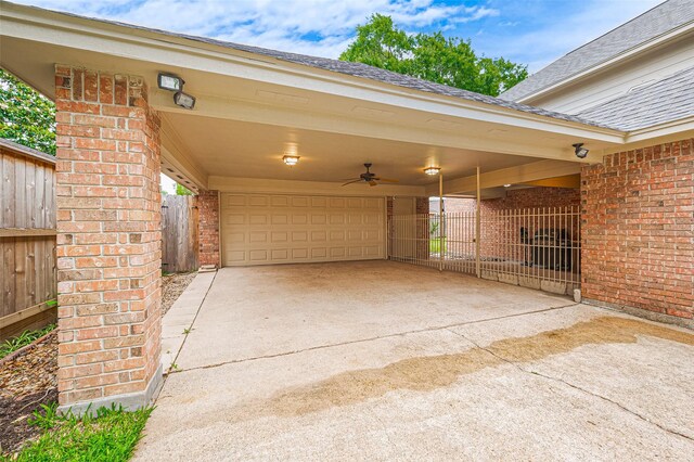 16218 Capri Dr, Jersey Village, TX 77040 - view of patio featuring driveway, a garage, a carport, and a gate