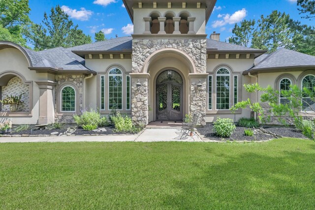 26118 Upper Beacon Pl, Montgomery, TX 77316 - property entrance featuring stucco siding, a yard, and french doors