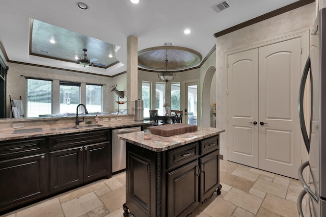 26118 Upper Beacon Pl, Montgomery, TX 77316 - kitchen featuring a sink, dishwasher, refrigerator, ornamental molding, and stone tile flooring