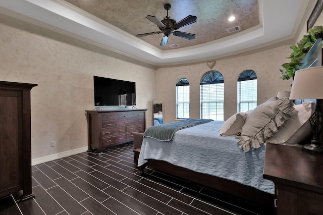 26118 Upper Beacon Pl, Montgomery, TX 77316 - bedroom featuring a raised ceiling, baseboards, ornamental molding, and ceiling fan