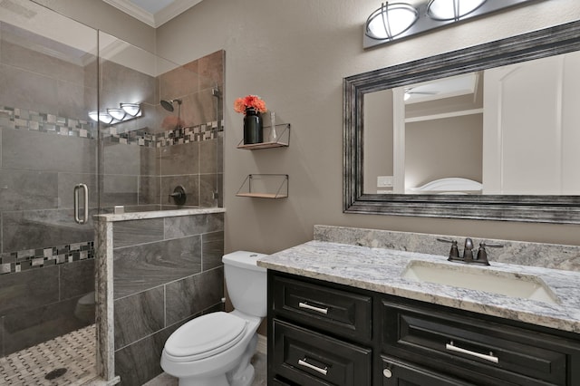 26118 Upper Beacon Pl, Montgomery, TX 77316 - full bathroom with a stall shower, toilet, ornamental molding, and vanity