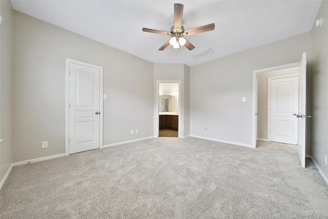 6010 Lovage Ave, Crosby, TX 77532 - unfurnished bedroom with carpet floors, baseboards, and connected bathroom