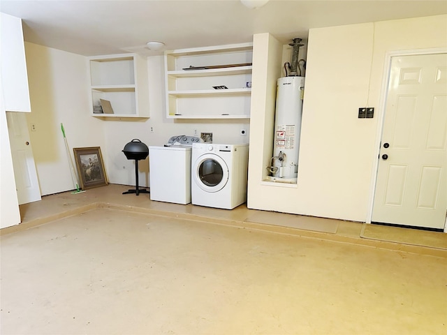 laundry area featuring gas water heater and washing machine and clothes dryer
