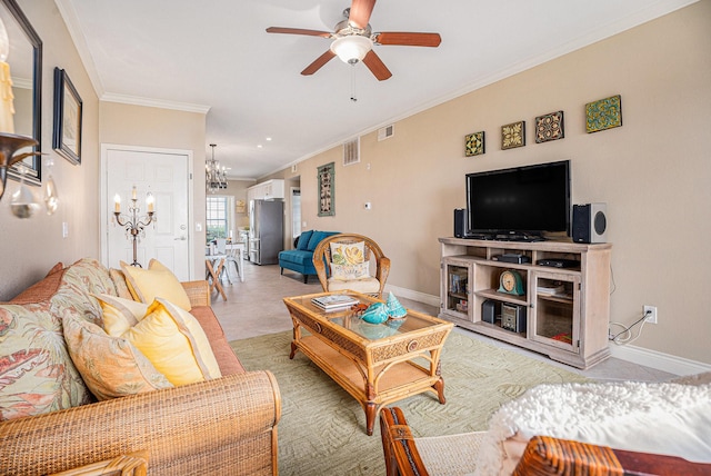 7000 Seawall Blvd Unit 1011, Galveston, TX 77551 - living area with a chandelier, crown molding, ceiling fan, baseboards, and light tile patterned floors