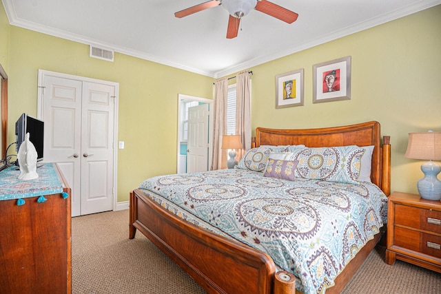 7000 Seawall Blvd Unit 1011, Galveston, TX 77551 - carpeted bedroom with ornamental molding, baseboards, and a ceiling fan