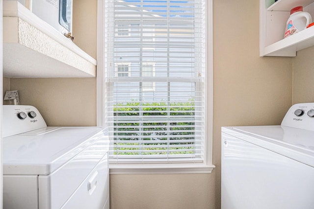 7000 Seawall Blvd Unit 1011, Galveston, TX 77551 - laundry area with washer and dryer