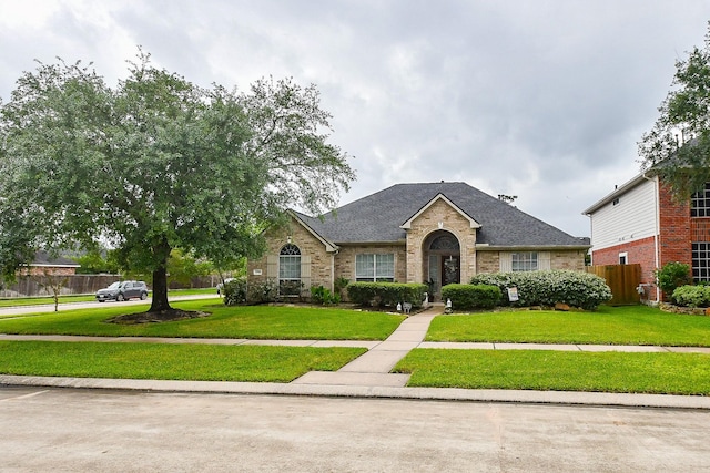 15203 Cypress Post Ln, Cypress, TX 77429 - traditional-style house with brick siding and roof with shingles