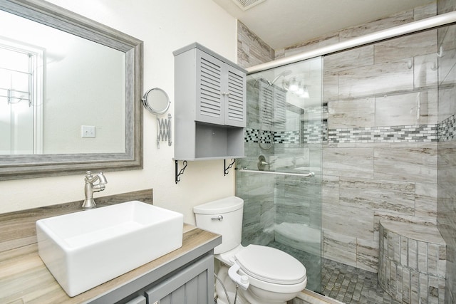 15203 Cypress Post Ln, Cypress, TX 77429 - bathroom with toilet, a shower stall, and vanity