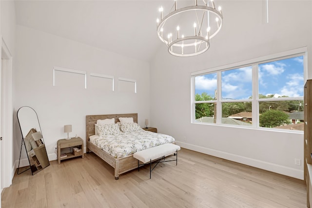 2202 Hewitt Dr, Houston, TX 77018 - bedroom featuring a chandelier, baseboards, light wood-style floors, and high vaulted ceiling