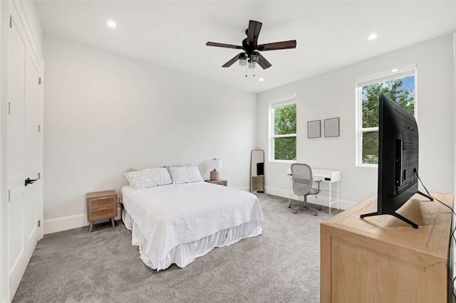 2202 Hewitt Dr, Houston, TX 77018 - bedroom with baseboards, light carpet, recessed lighting, and a ceiling fan