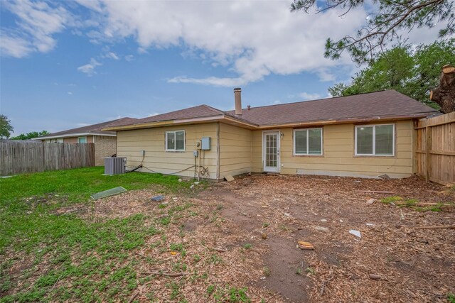 16250 Rancho Blanco Dr, Houston, TX 77083 - back of property featuring central AC unit
