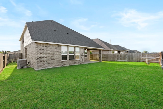 rear view of house featuring brick siding, central AC unit, roof with shingles, and a patio area