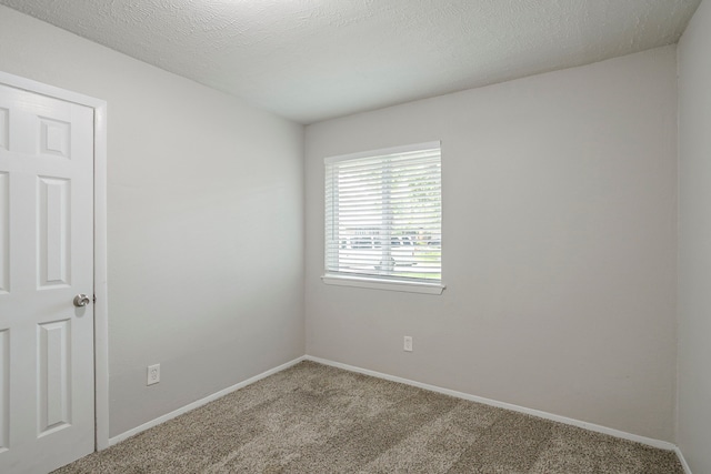 5102 Enchanted Timbers Dr, Humble, TX 77346 - carpeted empty room featuring baseboards