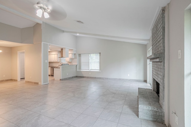 5102 Enchanted Timbers Dr, Humble, TX 77346 - unfurnished living room featuring a fireplace, a ceiling fan, light tile patterned floors, high vaulted ceiling, and baseboards