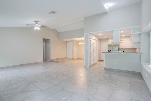5102 Enchanted Timbers Dr, Humble, TX 77346 - unfurnished living room featuring vaulted ceiling, ceiling fan, a chandelier, recessed lighting, and light tile patterned flooring
