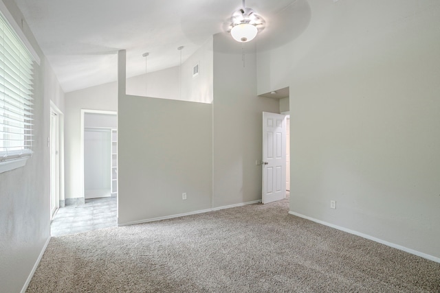 5102 Enchanted Timbers Dr, Humble, TX 77346 - carpeted empty room featuring lofted ceiling, baseboards, and a ceiling fan