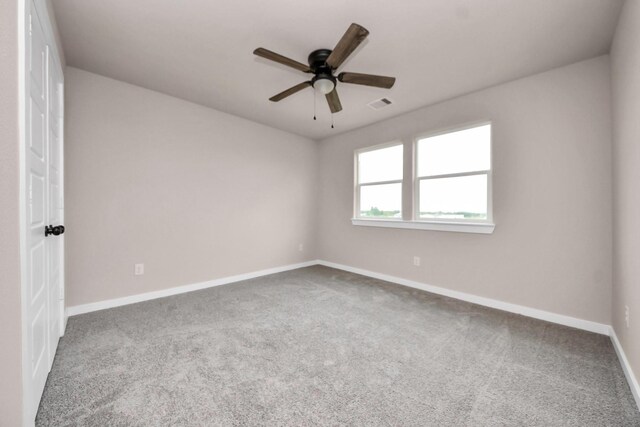 11141 Rd 5503, Cleveland, TX 77327 - empty room with carpet floors, baseboards, and a ceiling fan