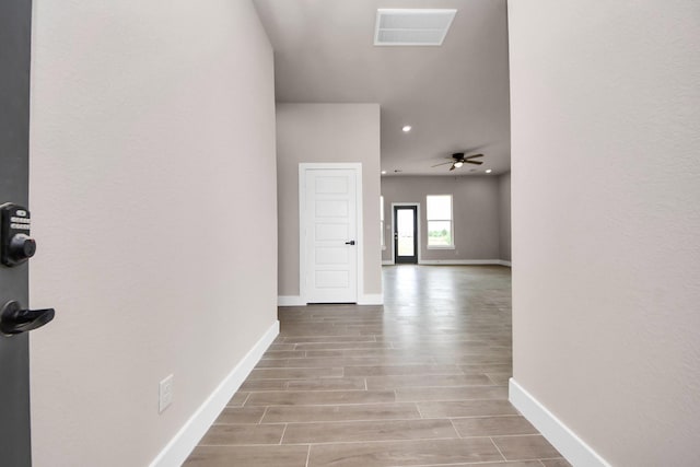 11141 Rd 5503, Cleveland, TX 77327 - corridor with baseboards, wood finished floors, and recessed lighting