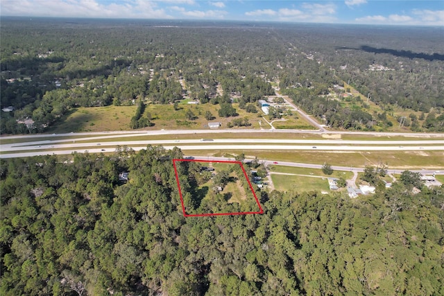 26472 Fm 1485th Rd, New Caney, TX 77357 - view of property location featuring a heavily wooded area and property parcel outlined