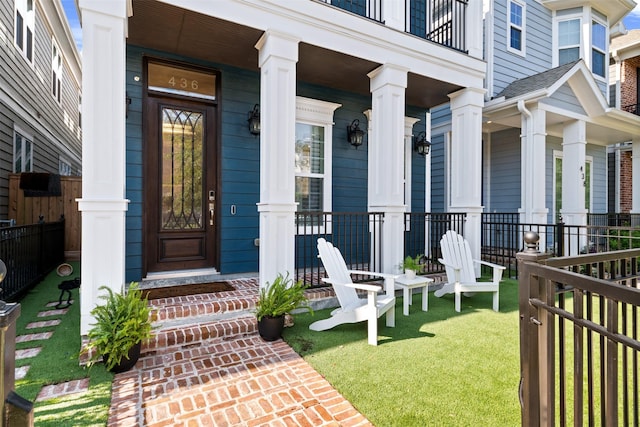 436 W 26th St, Houston, TX 77008 - property entrance featuring a porch and a yard