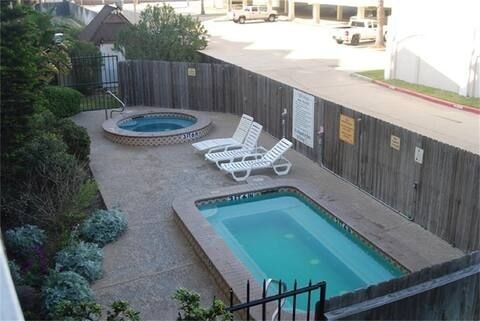 6300 Seawall Blvd Unit 9228, Galveston, TX 77551 - view of pool with a community hot tub and a patio area