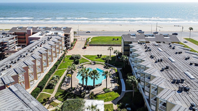 6300 Seawall Blvd Unit 9228, Galveston, TX 77551 - drone / aerial view of a pool area and waterfront with a beach