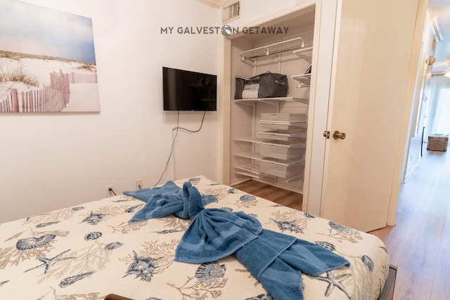6300 Seawall Blvd Unit 9228, Galveston, TX 77551 - bedroom with wood finished floors