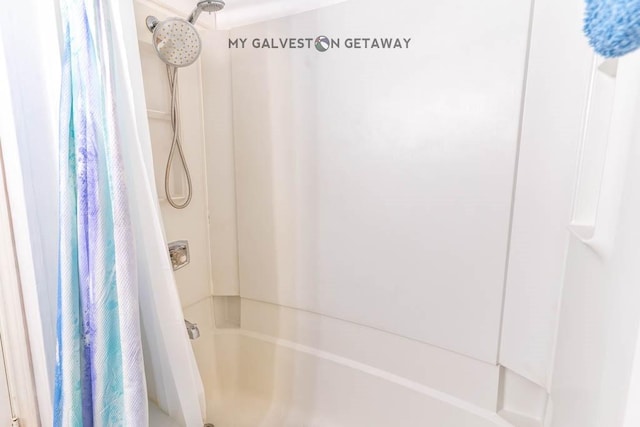 6300 Seawall Blvd Unit 9228, Galveston, TX 77551 - bathroom featuring shower / bathtub combination with curtain