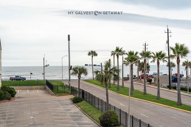 6300 Seawall Blvd Unit 9228, Galveston, TX 77551 - surrounding community with fence and a water view