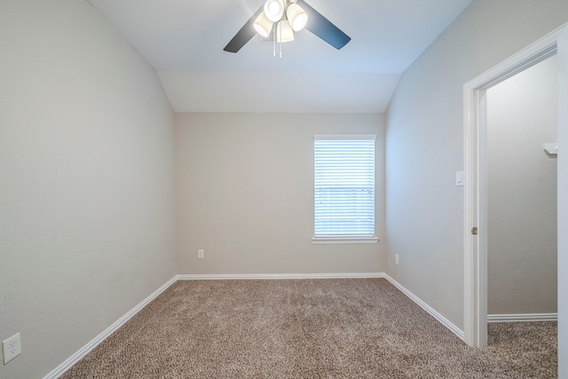 16702 Peralta Bay Cir, Crosby, TX 77532 - empty room with carpet flooring, a ceiling fan, vaulted ceiling, and baseboards