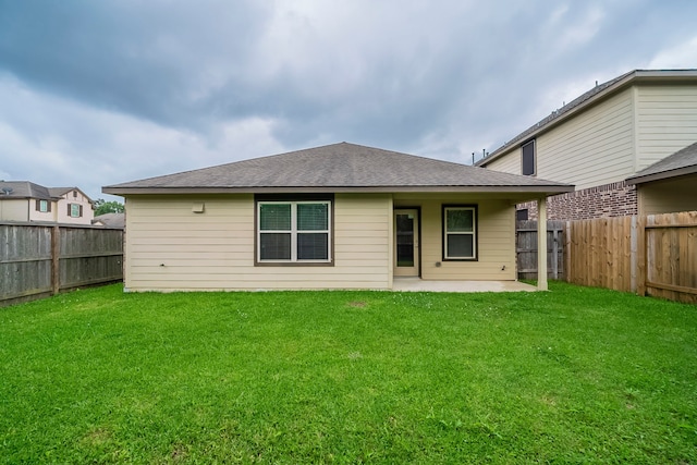 16702 Peralta Bay Cir, Crosby, TX 77532 - rear view of house with a patio area and roof with shingles