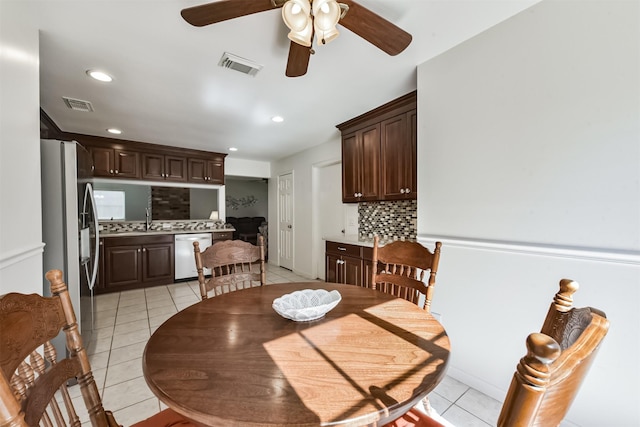 dining space featuring light tile patterned floors, a ceiling fan, and recessed lighting