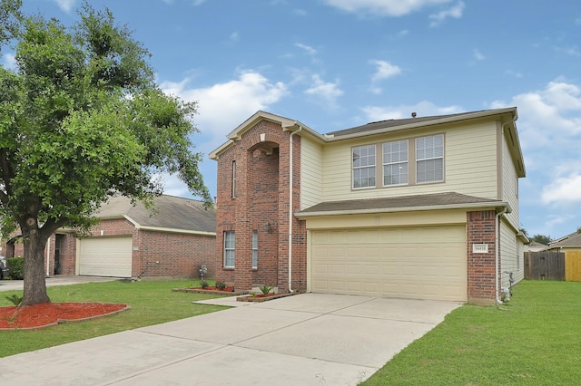 14418 Cellini Dr, Cypress, TX 77429 - traditional-style house featuring concrete driveway, brick siding, and a garage