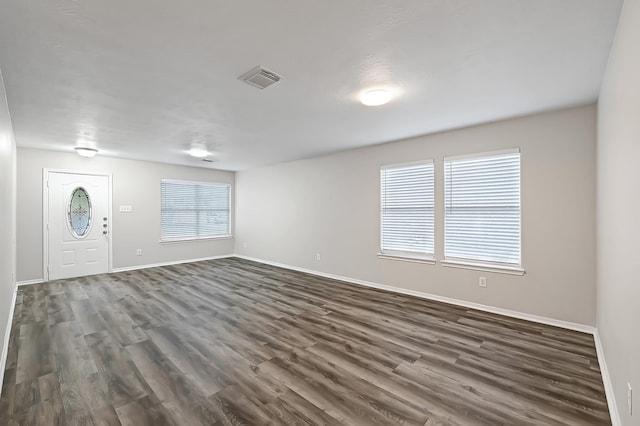 14418 Cellini Dr, Cypress, TX 77429 - entrance foyer with baseboards and dark wood-type flooring