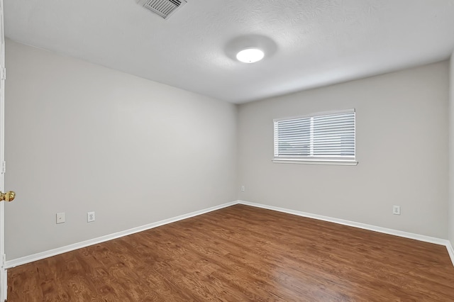 14418 Cellini Dr, Cypress, TX 77429 - empty room with wood finished floors and baseboards