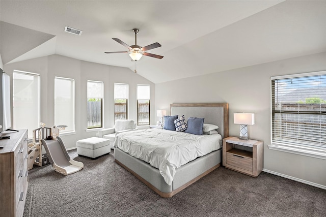 3306 Old Ironwood Dr, Spring, TX 77386 - bedroom featuring vaulted ceiling, dark colored carpet, baseboards, and a ceiling fan