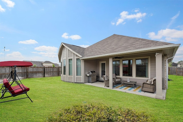 3306 Old Ironwood Dr, Spring, TX 77386 - back of house with outdoor lounge area, a patio, roof with shingles, and a ceiling fan