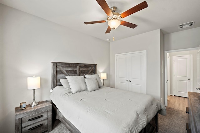3306 Old Ironwood Dr, Spring, TX 77386 - bedroom with a closet, wood finished floors, and ceiling fan